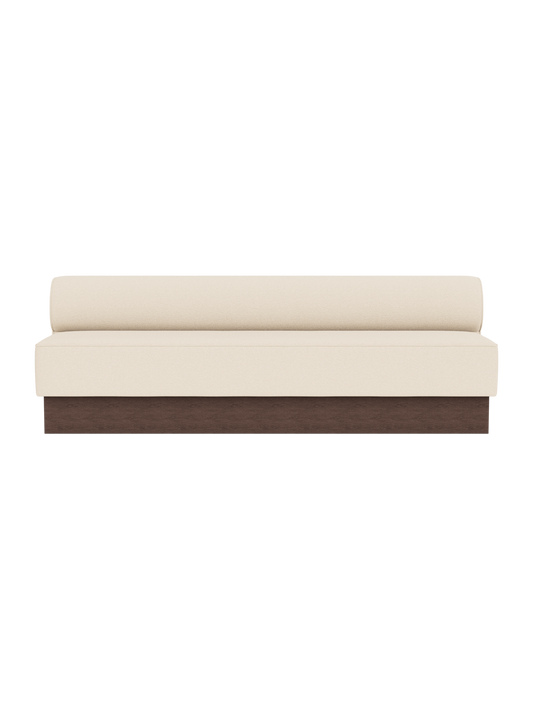 Eave Dining Sofa, Plateau in Logan Jasmine upholstery with a dark stained oak base, viewed from the front.