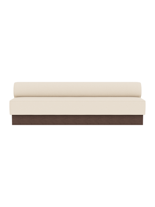 Eave Dining Sofa, Plateau upholstered in Logan Jasmine fabric with a dark stained oak base, viewed from the front.