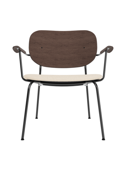 Co Lounge Chair featuring a dark stained oak backrest and Logan Jasmine upholstered seat on a black steel frame.