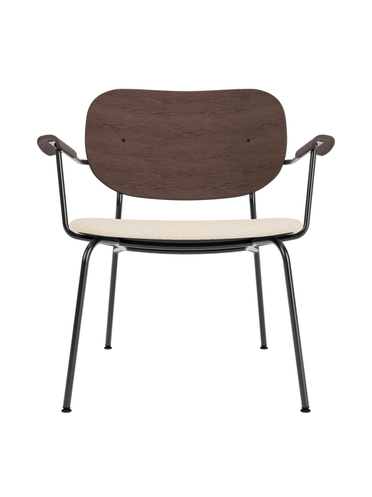Co Lounge Chair featuring a dark stained oak backrest and Logan Jasmine upholstered seat on a black steel frame.