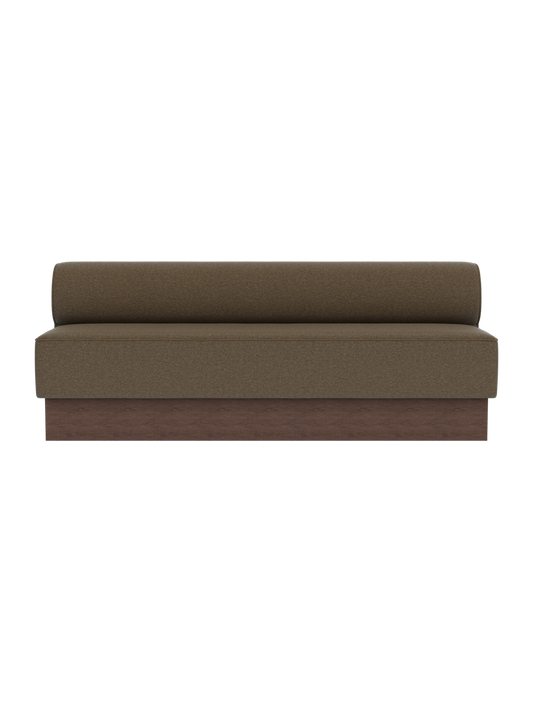 Eave Dining Sofa, Plateau upholstered in Logan Nutmeg fabric with a dark stained oak wooden base, shown from the front.