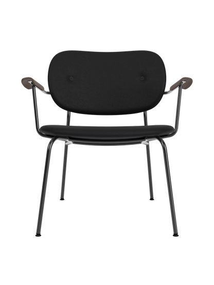 Fully upholstered Co Lounge Chair in black leather with dark stained oak armrests and a slender black steel base.