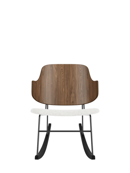 The Penguin Rocking Chair featuring a curved walnut back, light grey upholstered seat and black steel rockers.