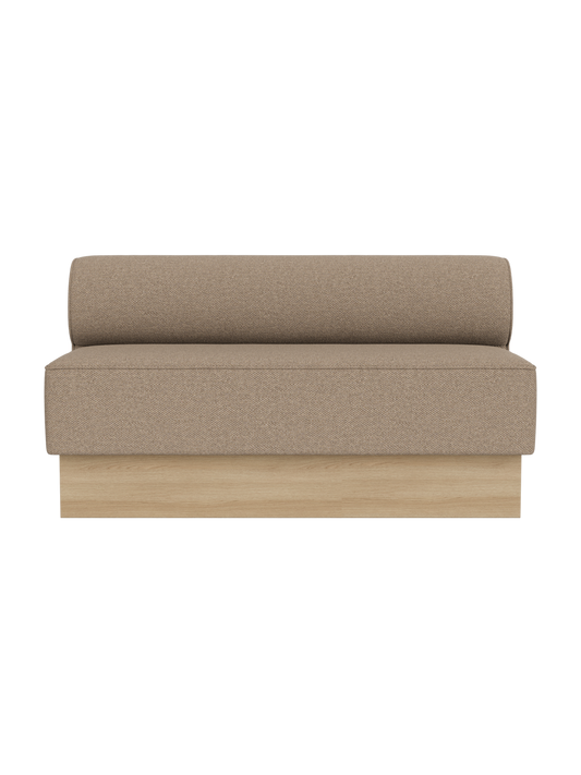 The Eave Dining Sofa, Plateau in Logan Flint upholstery with a natural oak base, shown from the front.