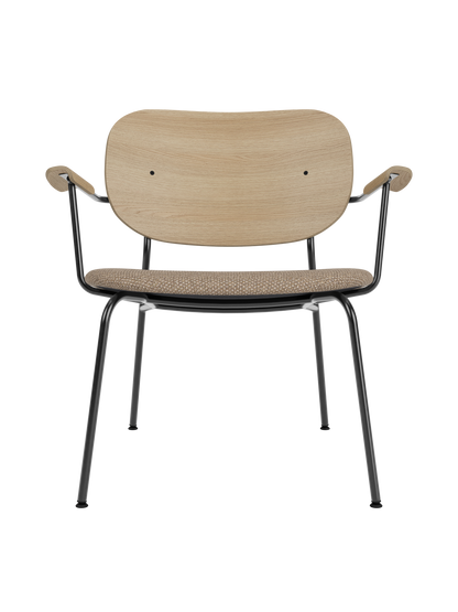 Co Lounge Chair featuring a natural oak backrest and Logan Flint upholstery on a minimalist black steel frame.