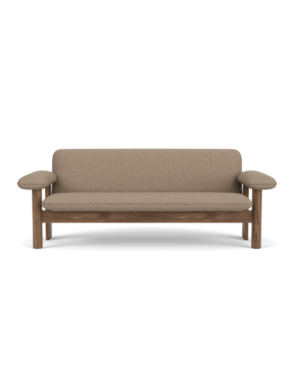 Front view of the Brasilia Sofa, featuring a solid walnut wood frame and light brown Logan Flint textile upholstery.