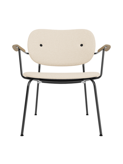 Fully upholstered Co Lounge Chair in Logan Jasmine fabric with natural oak armrests and a slender black steel frame.