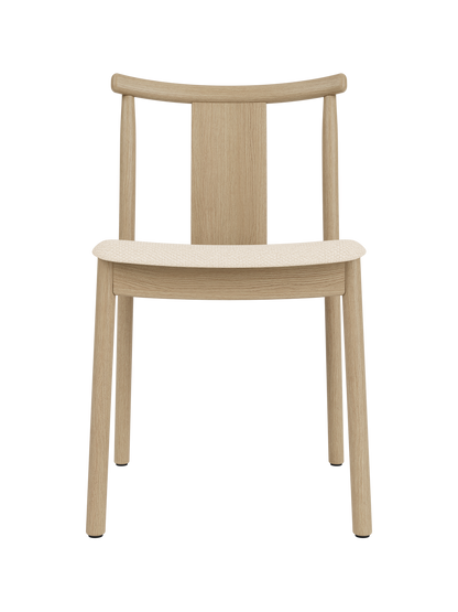 Merkur Dining Chair in natural oak with a Logan Jasmine upholstered seat, featuring a curved backrest and clean lines.