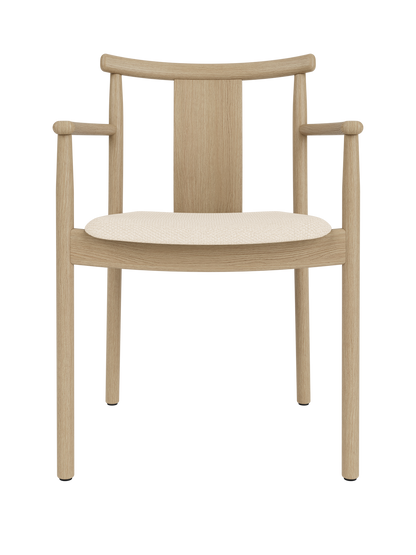 Merkur Dining Chair with Armrests in natural oak wood featuring a light Logan Jasmine upholstered seat.