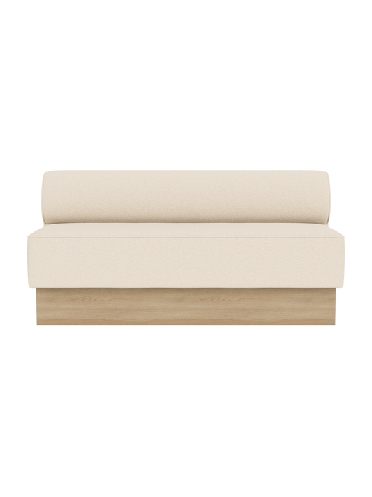 Eave Dining Sofa, Plateau in Logan Jasmine upholstery with a natural oak base, shown from the front.