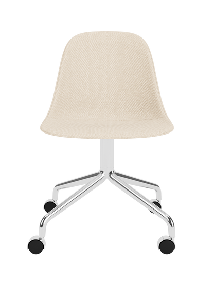 Harbour Side Dining Chair in Logan Jasmine fabric with a polished aluminium star base and black swivel casters.