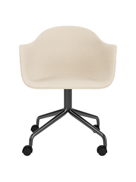 Harbour Dining Chair featuring Logan Jasmine upholstery and a black powder-coated star base with casters.