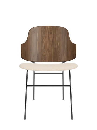 The Penguin Dining Chair with a walnut veneer back and cream Logan Jasmine upholstered seat on a black steel frame.
