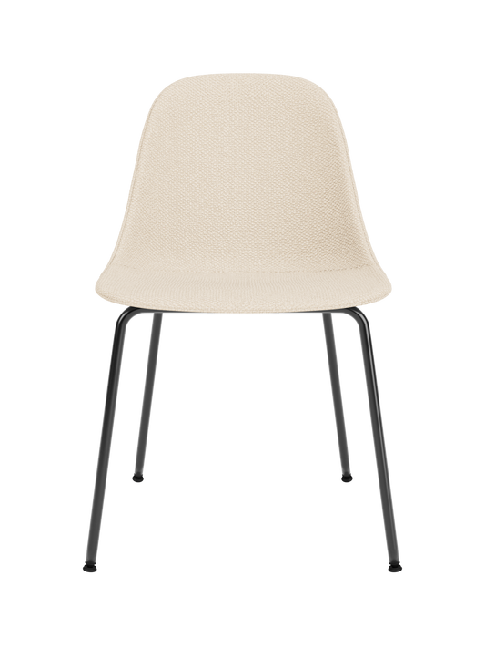 Harbour Side Dining Chair featuring a textured Logan Jasmine upholstery and slim black steel legs.
