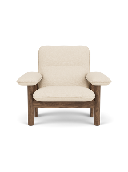 Front view of the Brasilia Lounge Chair with a solid walnut frame and cream Logan Jasmine fabric upholstery.
