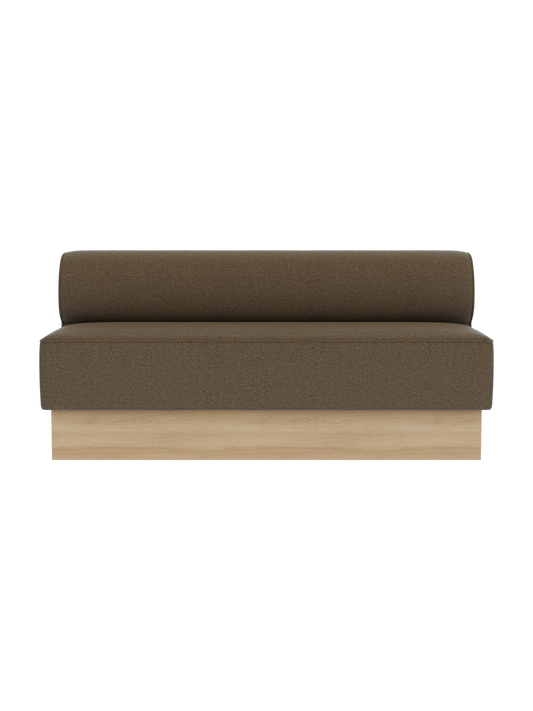 The Eave Dining Sofa, Plateau upholstered in Logan Nutmeg fabric with a natural oak base.