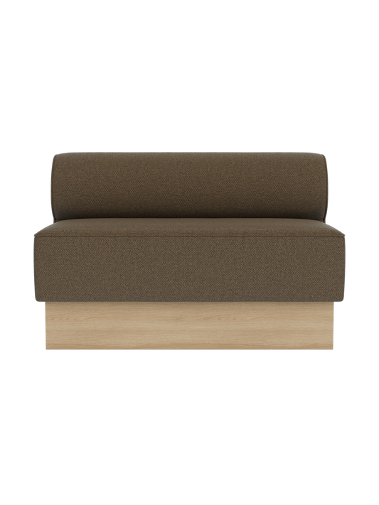 Eave Dining Sofa in Logan Nutmeg upholstery with a natural oak base, shown in a straight module configuration.