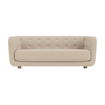 Vilhelm Sofa in beige Zero 0001 fabric featuring a button-detailed back and natural oak legs on a white background.