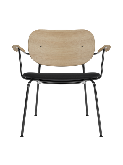 Co Lounge Chair in natural oak with a black Sierra 1001 leather upholstered seat and powder-coated steel frame.