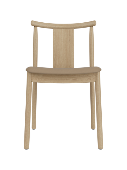 Merkur Dining Chair in natural oak with a tan Sierra leather seat, featuring a minimalist solid wood frame.