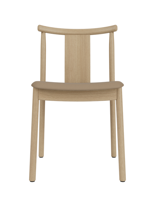 Merkur Dining Chair in natural oak with a tan Sierra leather seat, featuring a minimalist solid wood frame.