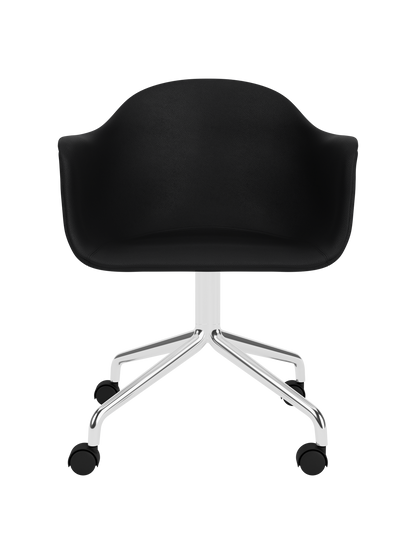 Harbour Dining Chair with black Sierra leather upholstery and a polished aluminium star base on rolling castors.