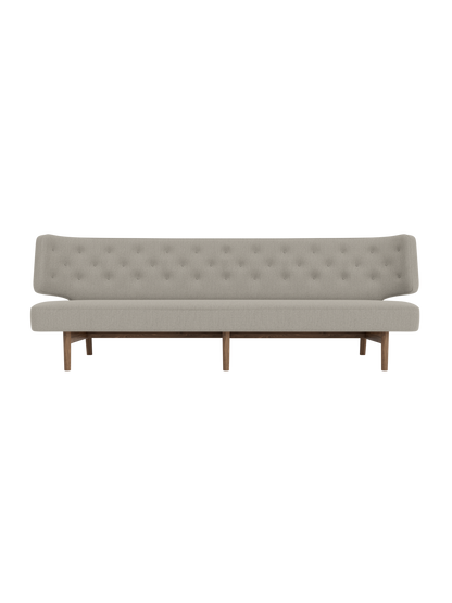 Radiohus 3-seater Sofa in grey Re-wool 218 upholstery with walnut wood legs and a curved, quilted backrest.