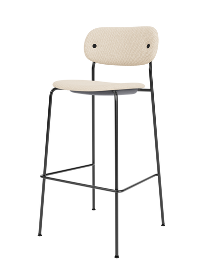 Fully upholstered Co Bar Chair in Logan Jasmine fabric with a minimalist black tubular steel frame and footrest.