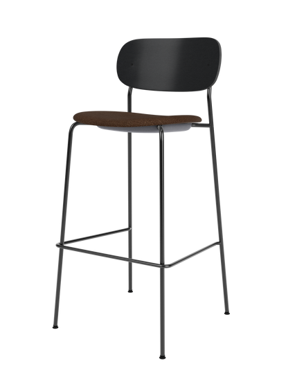 Co Bar Chair featuring a black painted oak back and brown bouclé upholstered seat on a slender black steel frame.