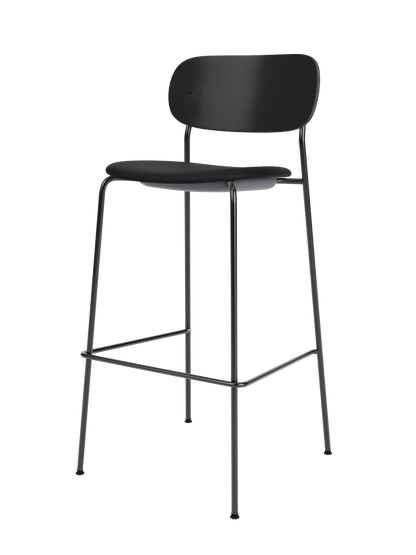 Black Co Bar Chair with an upholstered seat, black oak backrest and a slender black steel frame with footrest.