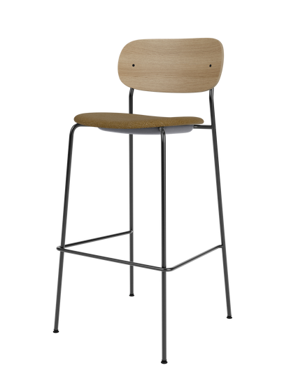 Co Bar Chair with natural oak backrest and brown bouclé upholstered seat on a slender black steel frame.