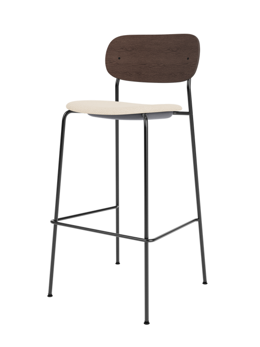Co Bar Chair with a black steel frame, dark stained oak backrest and Logan Jasmine upholstered seat.