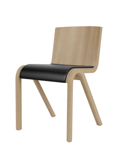 Ready Dining Chair in natural oak veneer with a black leather seat, featuring a curved, cantilevered silhouette.