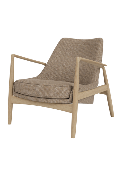The Seal Lounge Chair, Low Back in natural oak with textured Logan Flint fabric and an organic wooden frame.