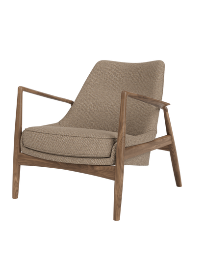 The Seal Lounge Chair, Low Back, with an angled walnut frame and textured Logan Flint fabric upholstery.