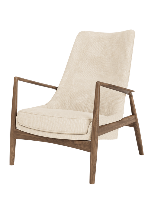 The Seal Lounge Chair, High Back featuring a solid walnut frame and cream Logan Jasmine textured upholstery.