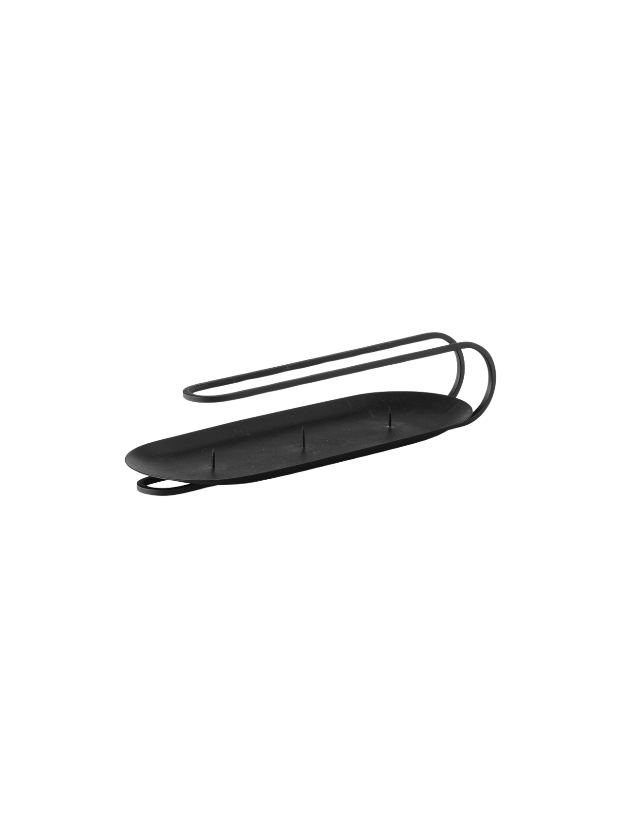 An angled shot of the black 3-arm Clip Table Candle Holder, featuring an oval base with three spikes and a minimalist handle.