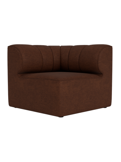 Eave Seamline Modular Sofa 86 Corner in dark brown Audo Bouclé 08 fabric with architectural vertical stitch detailing.