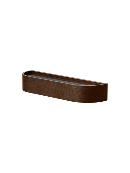 Dark stained oak Epoch Shelf featuring curved wood veneer and a floating design, viewed from a low angle.