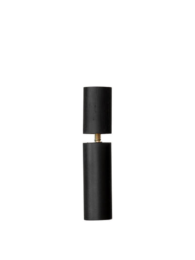 A black wood Co Chair Leg Extender, displayed as two cylindrical pieces joined by a central gold-coloured threaded screw.