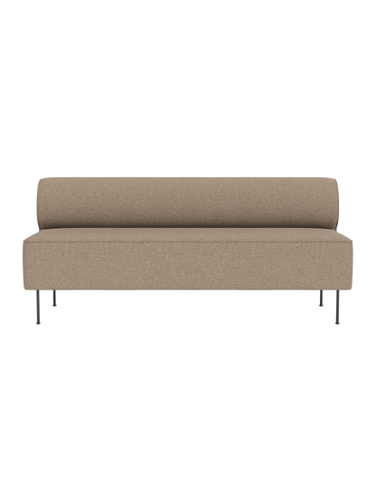 Front view of the Eave Dining Sofa in light brown Logan Flint fabric. The minimalist sofa has a low back and thin metal legs.