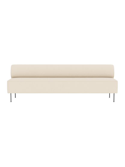 Front view of the Eave Dining Sofa in a light cream Logan Jasmine fabric. It features a minimalist design with a low back.