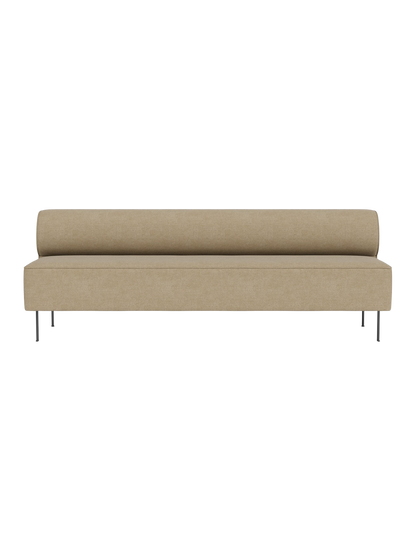 Front view of the Eave Dining Sofa in light beige Audo Bouclé 02. The armless sofa has a low back and slender metal legs.