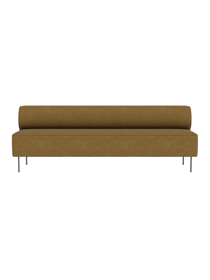 A front view of the Eave Dining Sofa, upholstered in a mustard-brown fabric with a low backrest and slender metal legs.