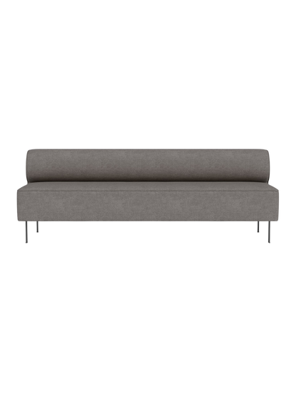 Front view of the Eave Dining Sofa in grey Audo Bouclé 16 fabric, showing its long, armless design and thin metal legs.
