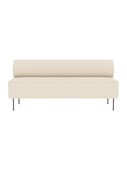 Front view of the Eave Dining Sofa in light Logan Jasmine, featuring a long seat, rounded backrest, and slim black legs.