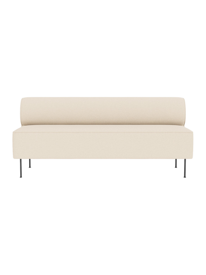 Front view of the Eave Dining Sofa in light cream Logan Jasmine fabric, showing its minimalist design and slender metal legs.