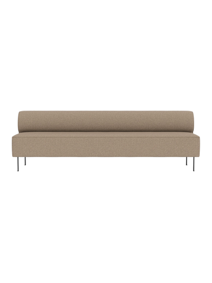 A front view of the Eave Dining Sofa in Logan Flint, a long light brown sofa with a low back and thin metal legs.