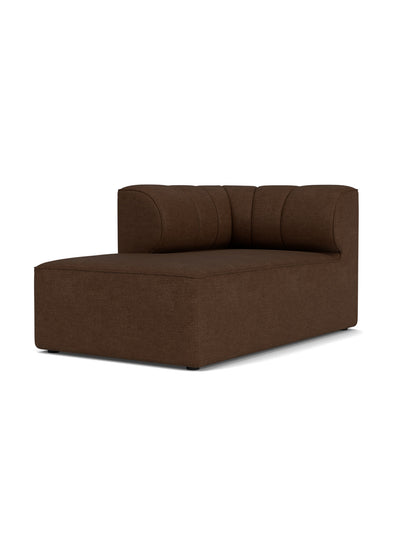 A front three-quarter view of the Eave Seamline Modular Sofa, 86, Chaise Longue in a dark brown bouclé fabric.