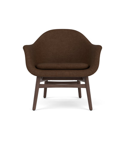 Harbour Lounge Chair with dark brown Audo Bouclé 07 upholstery and a sculptural dark stained oak wood frame.